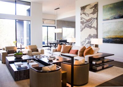 Modern living room with elegant decor and ample natural light.